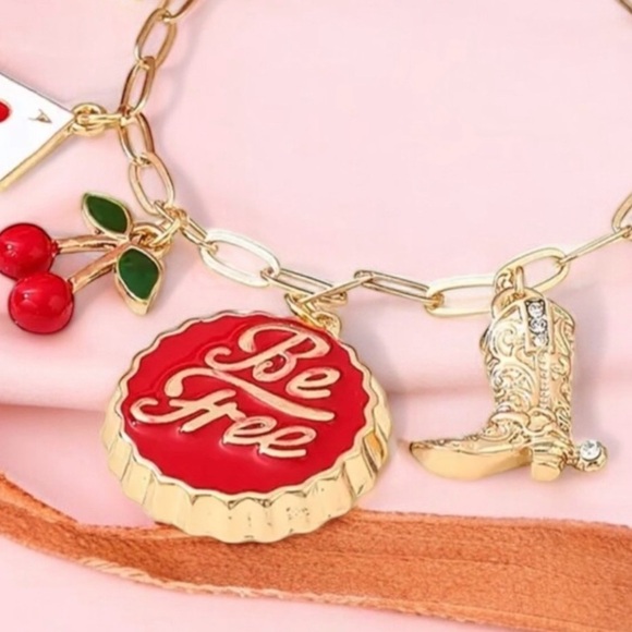 Gold toned dainty and fun Charm Necklace cherries, heart, boot and crystals - Picture 15 of 17